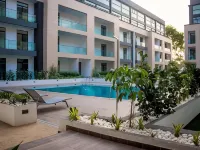 Embassy Gardens Luxury Suites Cpg Hotels near Labadi