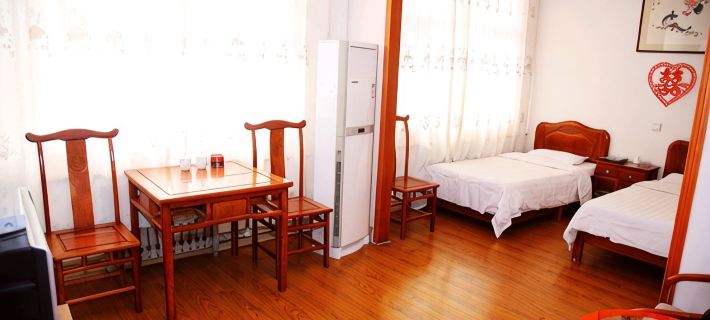 Linyi Jinma Business Hotel Hotel a Linqu