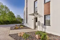 Modern apartment with stunning views of the water and the Rügen Bridge -  Privatzimmer