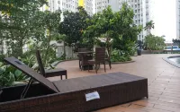 Simply and Cozy 2Br at Springlake Summarecon Bekasi Apartment by Travelio - Apartments
