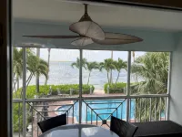Stunning beachfront condo next to restaurant & a short drive to famous RumPoint