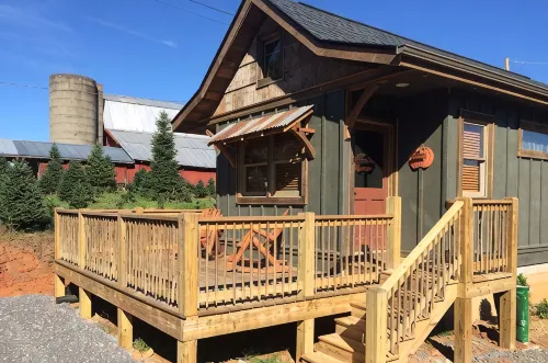 A hand-crafted cabin built in the middle of a Christmas Tree farm.