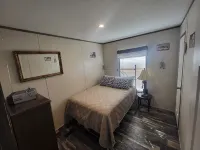 Cozy 3-bedroom 2 bath,5beds mobile home. Close to a boat launch. Covered parking - بيت ضيافة