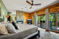 Stunning Views • Hot Tub • Sauna • Theater • Game Rooms • Sleep/Dine 23 •Firepit