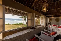 Msambweni Beach House and Private Villas Отели в г. Мсамбуэни