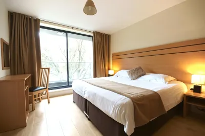 Lodge Drive Serviced Apartments Hotels near Vision Express Opticians at Tesco - Lea Valley