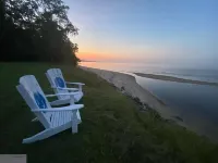 Cozy Cottage with access to and partially obstructed views of the bay.