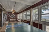 Amazing, sleeps 26, covered lakeside, bar, beach, Big St Germain Lake