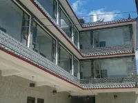 Yulong Hongyuezhuang Inn - Inns