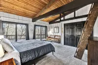 Spacious A-Frame sleeps 25 on 5 wooded acres with a private fishing pond