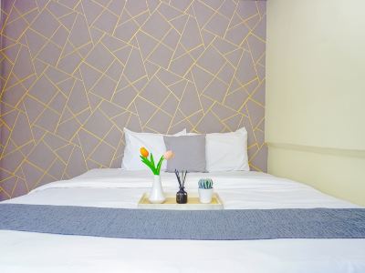 Modern Space and Restful 2BR at Apartment Meikarta By Travelio