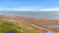 Seashell by the Seashore: Cozy 1BR Cottage Steps from Private Sandy Beach - 2-Star