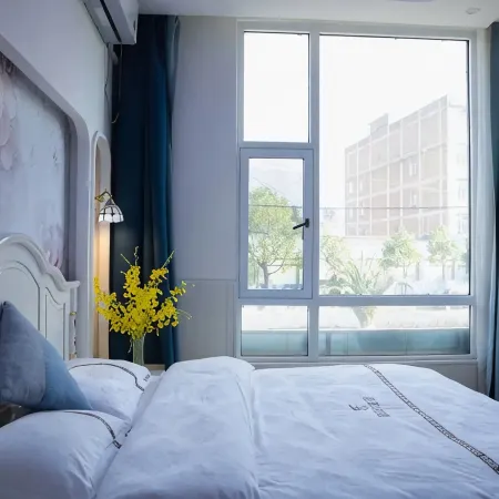 Hengfeng Theme Hotel (Xuanwei Railway Station Branch)