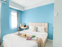 Neat Studio with Blue Toned Wall at Dramaga Tower Apartment By Travelio - 3-Star