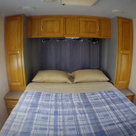 RV on private lot with pool 10 min walk to the beach