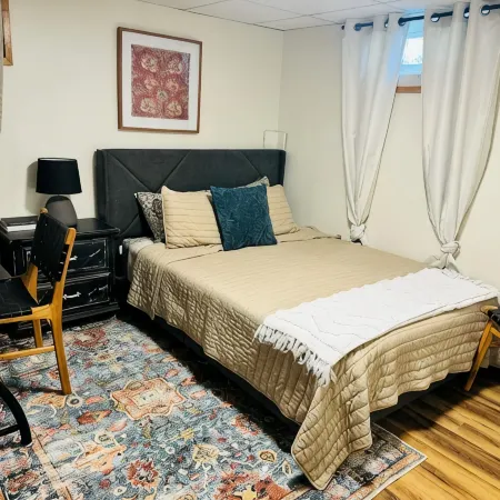 Spacious 4-bedroom house in Great Bend, KS with, Backyard Deck, Ping Pong Table