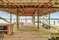 Cozy, French Cottage with Fishing Pier and Sunset View on Dog River