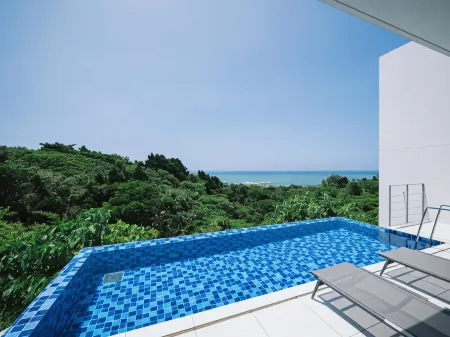 Blue Rela Luxe Resort Okinawa Отели рядом с достопримечательностью «National Institute of Information and Communications Technology Okinawa Electromagnetic Wave Technol»