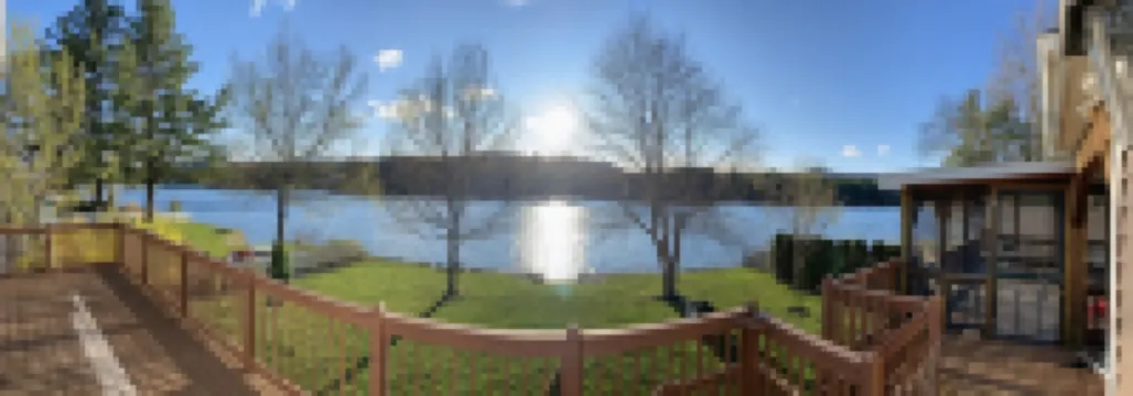 Beautiful 5 bedroom Waterfront House w/skiing/snowboarding/snow mobile path near