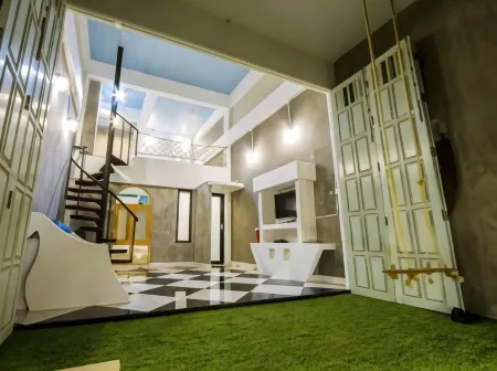 De Sea Almond Resort Отели рядом с достопримечательностью «Krom Luang Chumphon Khet Udomsak Royal Palace»