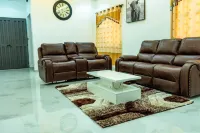 Cozy 2-bedroom apartment in beautiful Lome with AC, WiFi, security agent