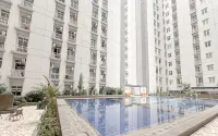 Comfy White Studio for 2 Pax at Bale Hinggil Apartment By Travelio - Apartments
