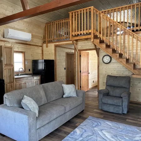 White cabin in the woods close to Univ. of Central Missouri and Whiteman AF Base