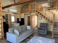 White cabin in the woods close to Univ. of Central Missouri and Whiteman AF Base