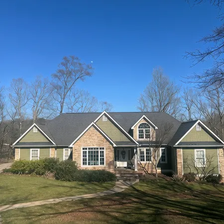 Beautiful lakefront home on over an acre with lots of room, views, and amenities