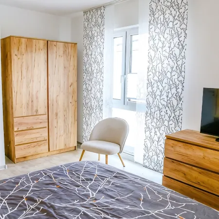Windland apartment house on Lake Goitzsche for 8 people with lake view Отели в г. Поух