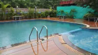 Southern Universal Farm House Hotels near Apr Agriculture Land, Ayandur