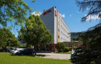 Hôtel ibis Archamps Porte de Genève Hôtels à proximité de : Le Grand Parc d'Andilly en été/hiver