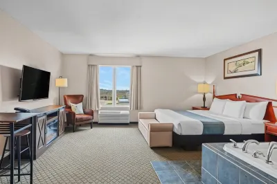 Days Inn & Suites by Wyndham Winkler Hotel a 