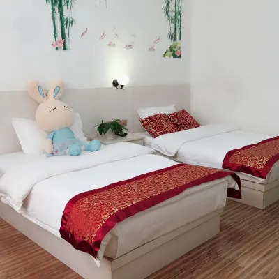 Xishuangbanna Manqini Hotel - Holiday Apartments