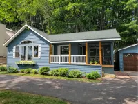 NEW! Renovated Bungalow steps from Lake Tomahawk - King Bed, Dock Space, Firepit - 4-Star