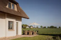 Dream thatched house with water view - 3 bedrooms - 10 min. walk to the beach - Wifi