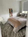 Oceanside beach retreat 3 min walk to beach Rooftop views - バルコニー