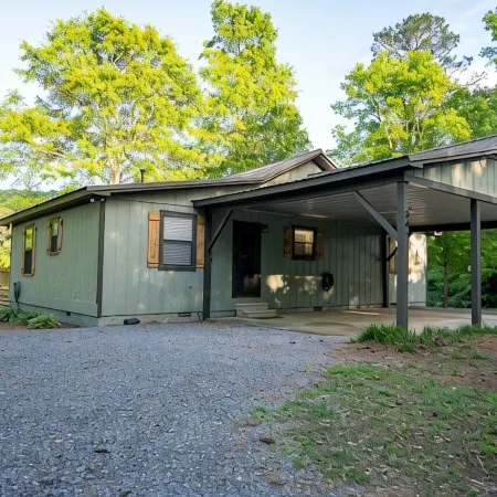 Paw Paw's Fish Tales Cabin on Lake Guntersville with 2 slip Boat Dock