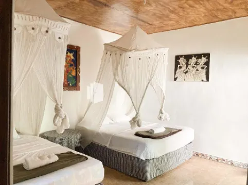 Taman Ayu Homestay Munduk Mitra RedDoorz Отели рядом с достопримечательностью «Водопад Мундук»