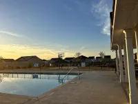 5 bedroom spacious home, with charcoal grill and seating. Peaceful neighborhood.