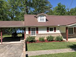 Waterfront with private boat ramp and dock for Fishermen and Families