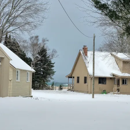 Waterfront house w/ large garage located on trail 8 in Grand Marais.