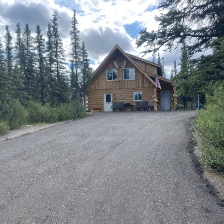 Log House on Denali Airstrip at Mile Post 229.5 of the Parks Highway.