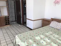 Cozy and Charming House with Pool and Gardens in a Beachfront Condominium!