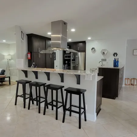 Designer 3 Br Home Heated Pool 3 mi. from the Beach & Downtown Private Backyard
