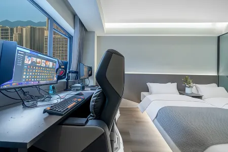 Jijing E-sports Homestay Отели рядом с достопримечательностью «Chongqing University of Posts and Telecommunications (University City Teaching Area)»