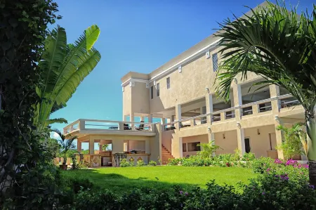 La Vue Boutique Inn Отели в г. Blowing Point Village