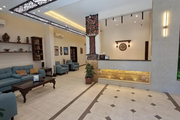 A welcoming view of the spacious lobby at Rumman Hotel