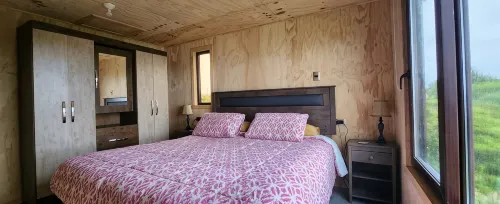 Spectacular house overlooking the sea, come and relax, it is cozy and bright. Hotels in Chonchi