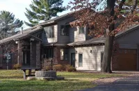 Spacious 7-bedroom house on the Lake, with AC, WiFi,  in peaceful Menomonie WI